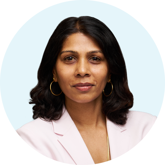 Headshot of Kelly Fernando in a light blue circular frame.